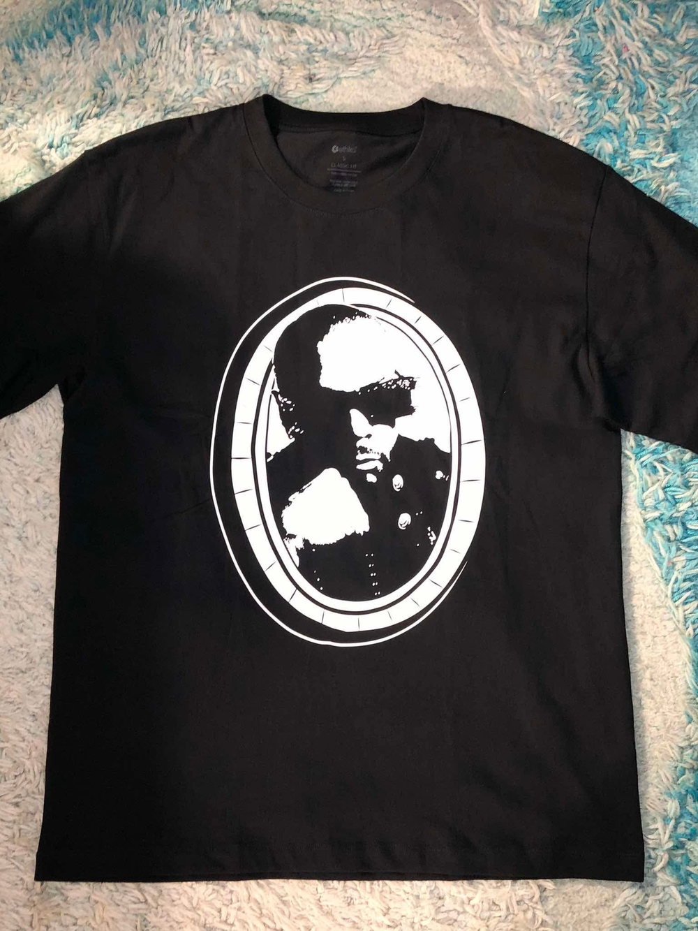 ethika Black Short-Sleeve Tee with White Oval Portrait Graphic